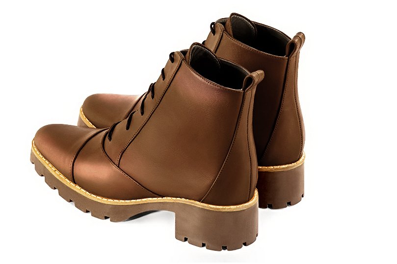 Caramel brown women's ankle boots with laces at the front. Round toe. Low rubber soles. Rear view - Florence KOOIJMAN